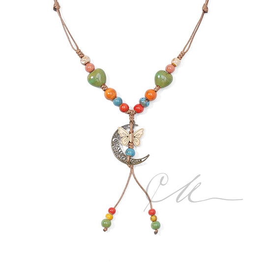 Selune | Handmade Ceramic & Wood Necklace – Butterfly in the Moon