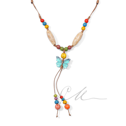 Niva | Handmade Ceramic Bead Necklace – Blue Butterfly & Colorful Whimsy