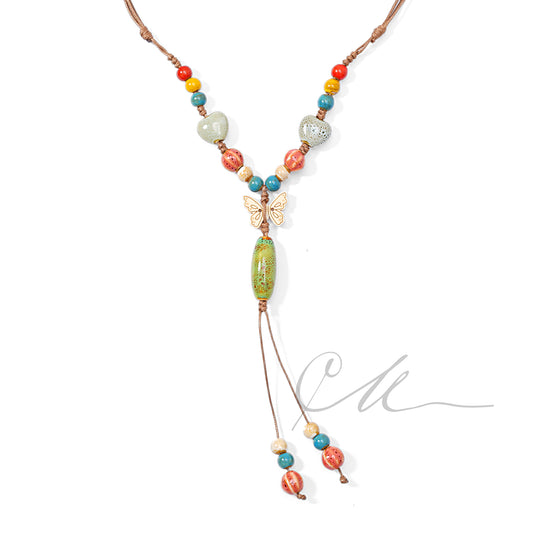 Keriya | Handmade Multicolor Ceramic Bead Necklace with Wooden Butterfly – Adjustable Cord