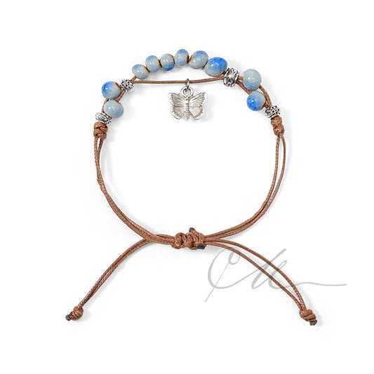 Lunira | Handmade Sky Blue Ceramic Bracelet with Butterfly Pendant